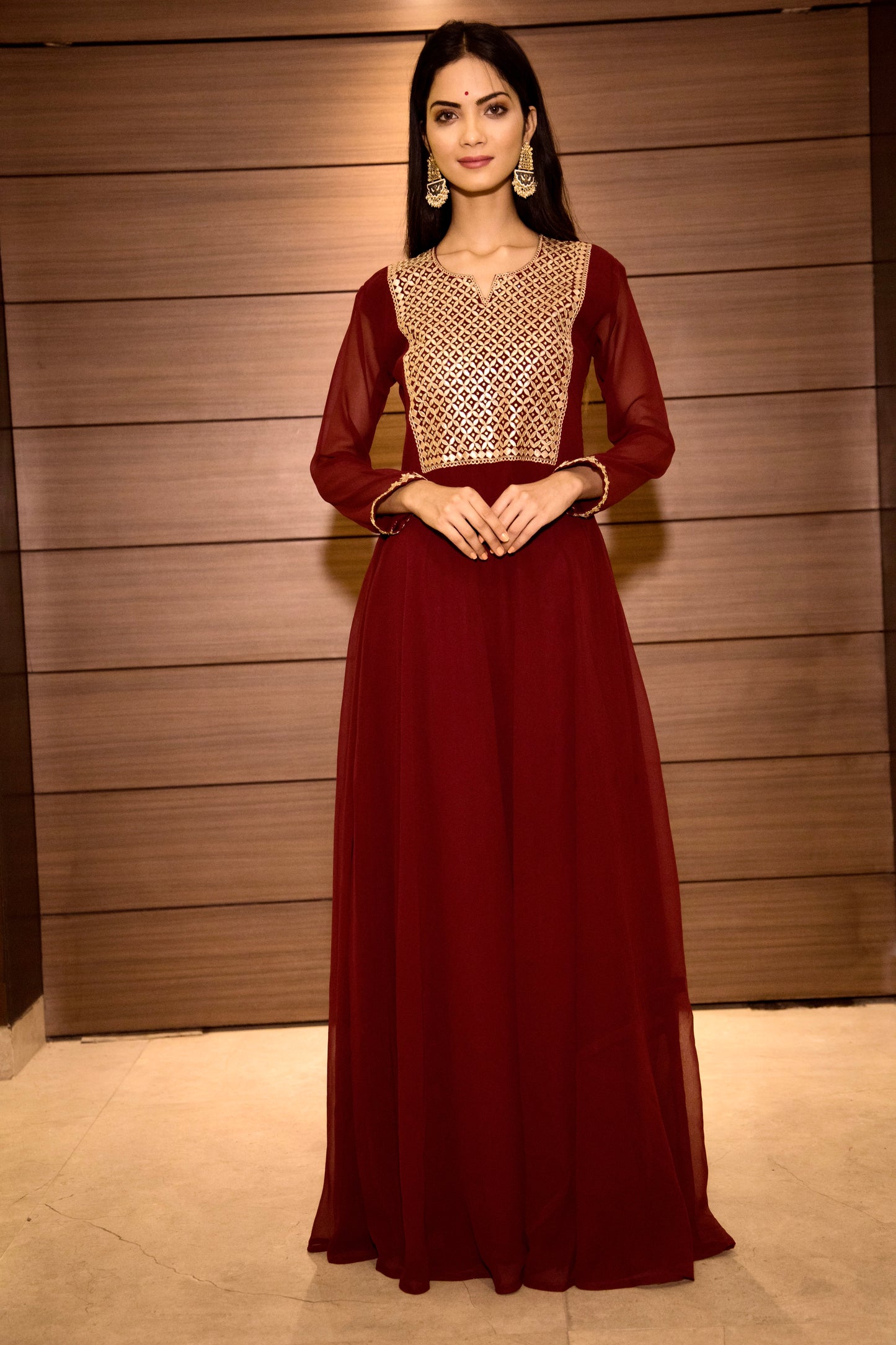 Party wear gown with gota patti hand embellishment.